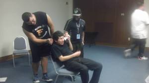 Trujillo being punished by audience members in "Penalty Hat" in a recent Premature Punchline performance. 